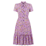 1950s Colorful Floral Print Short Sleeve Button Up Bow Tie Neck Ruffle Hem Vintage Dress