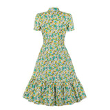 1950s Colorful Floral Print Short Sleeve Button Up Bow Tie Neck Ruffle Hem Vintage Dress